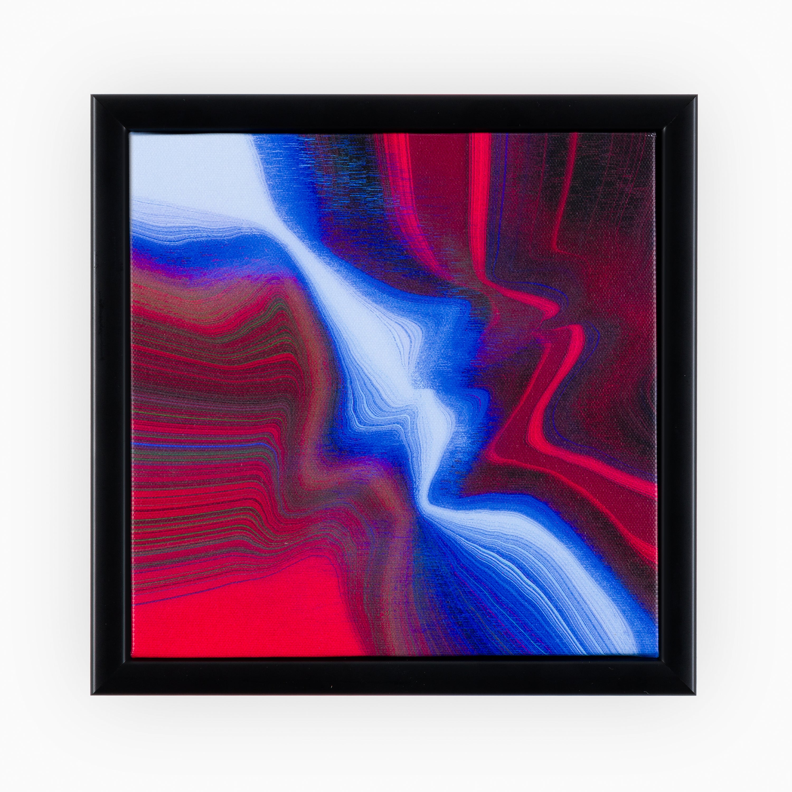 High-end abstract canvas art featuring fluid waves of deep red and vivid blue, creating a dynamic contrast, all set within a bold black frame.